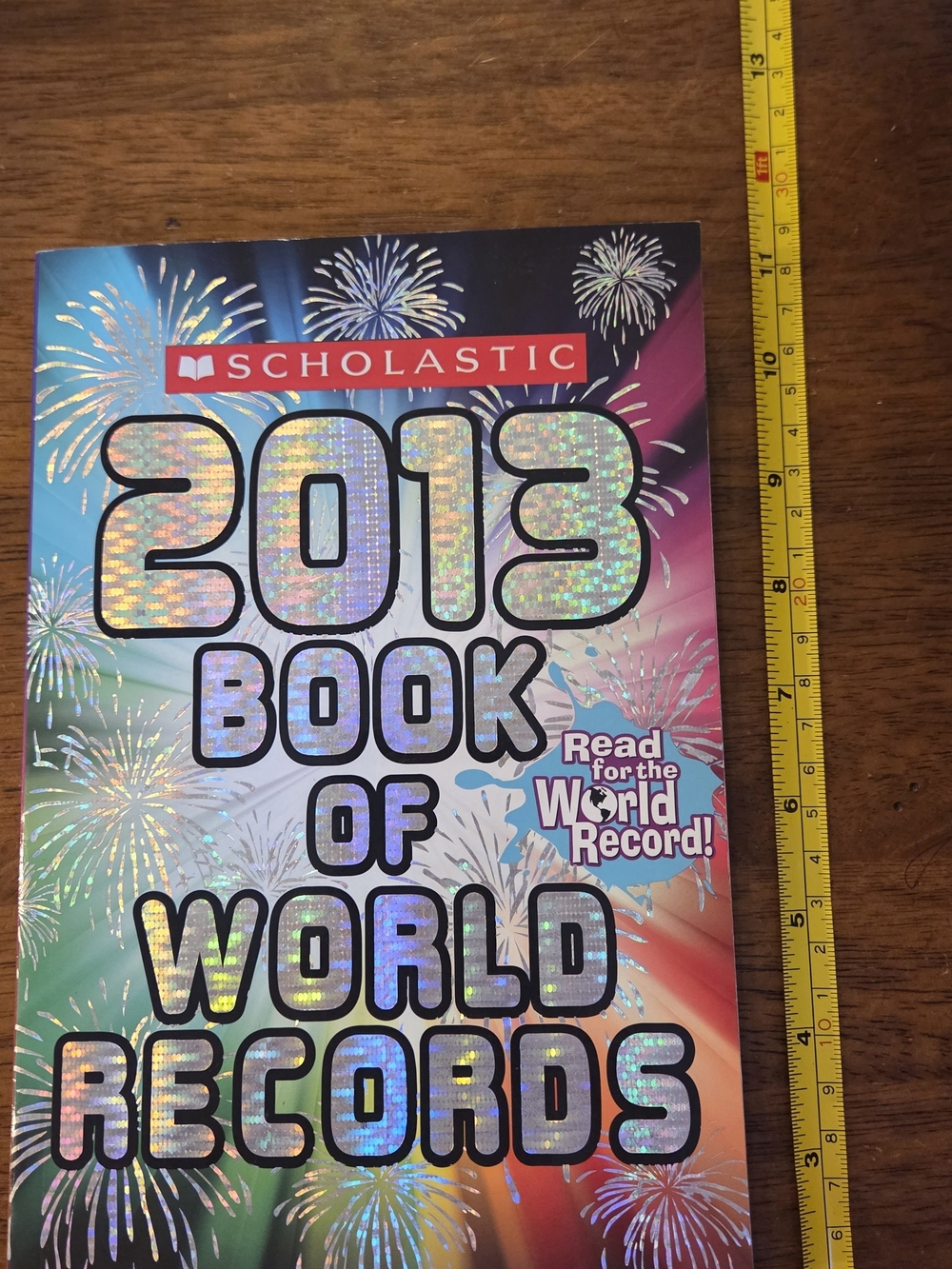 π5/$10π Scholastic Holographic Multicolor 2013 Book of World Records Cover